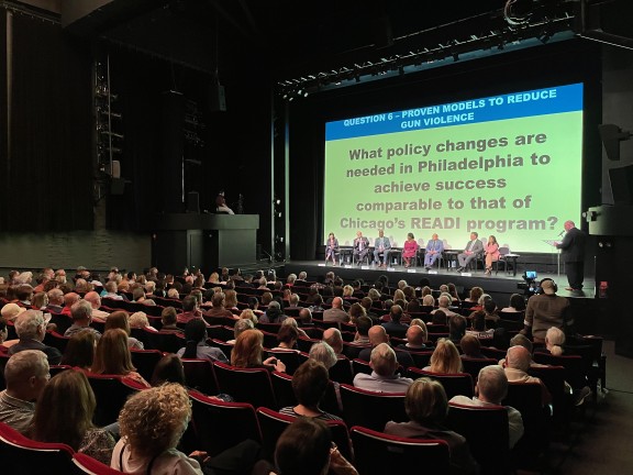 Full audience and panel of mayoral candidates at Philadelphia Film Center