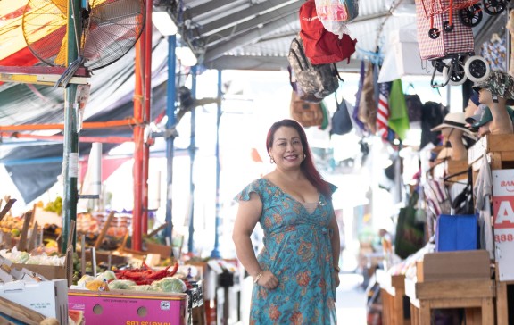 Woman standing in a South Philadelphia open air market