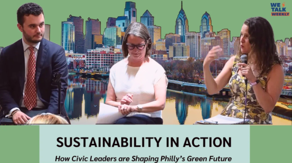 Three panelists in front of a picture of Philadelphia skyline