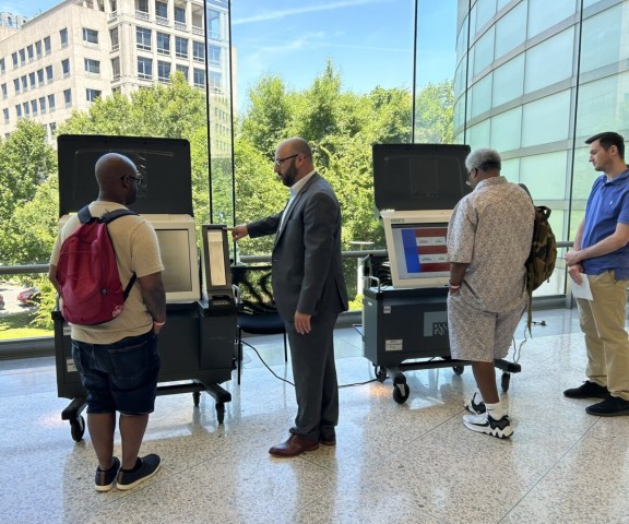 Voters getting a demo of PA voting machines