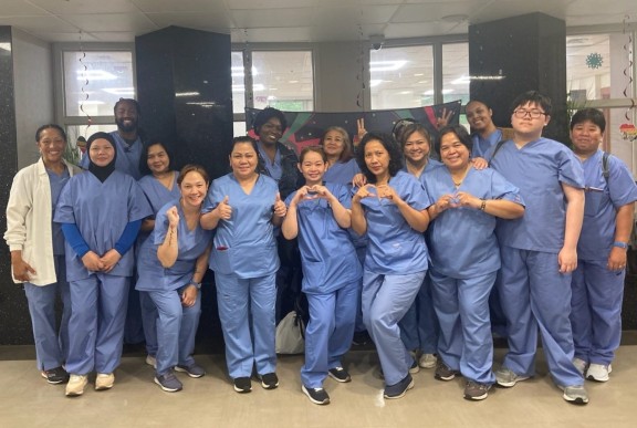 Photo of immigrants who have become certified nursing assistants and home health aids