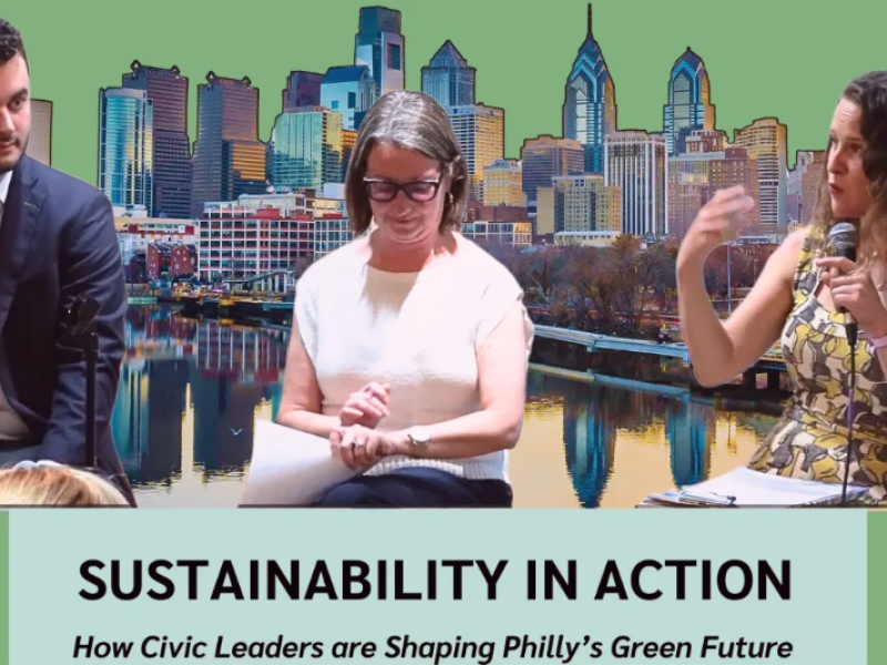 Three panelists in front of a picture of Philadelphia skyline