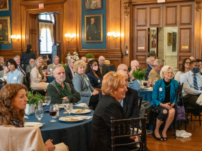 People at a luncheon looking towards a speaker