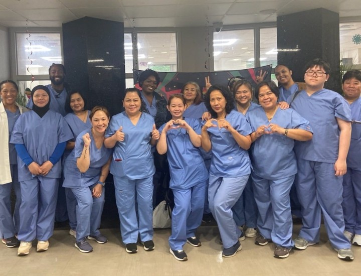 Photo of immigrants who have become certified nursing assistants and home health aids